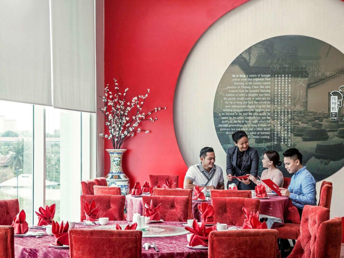 Готель Pullman Кучінг Екстер'єр фото The restaurant
